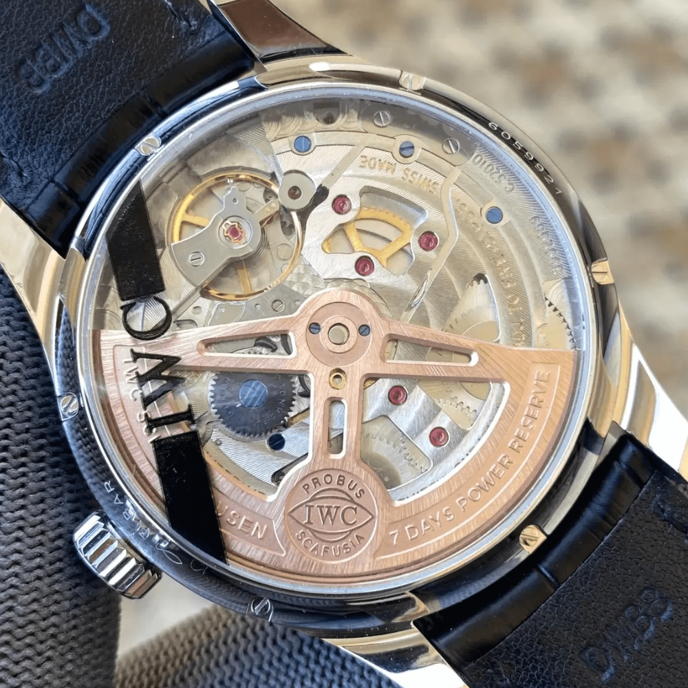 IWC 포르투기저 퍼페츄얼 캘린더 화이트골드 화이트 다이얼 44mm IW503406