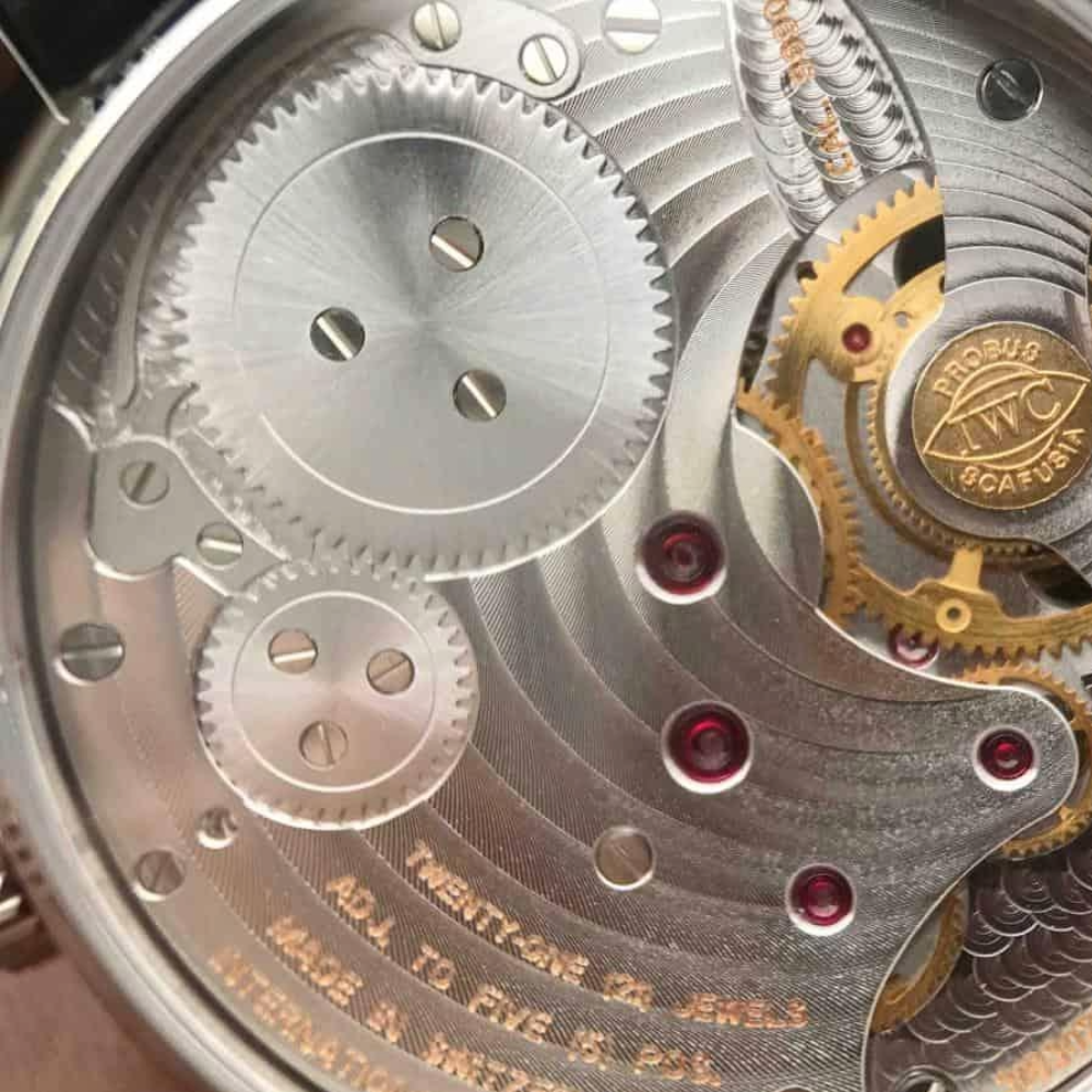 IWC 포르투기저 투르비옹 오토매틱 스틸 화이트 다이얼 레더 스트랩 42mm IW546302